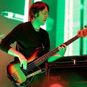 Бас-гитарист Radiohead примет участие в состязаниях по триатлону